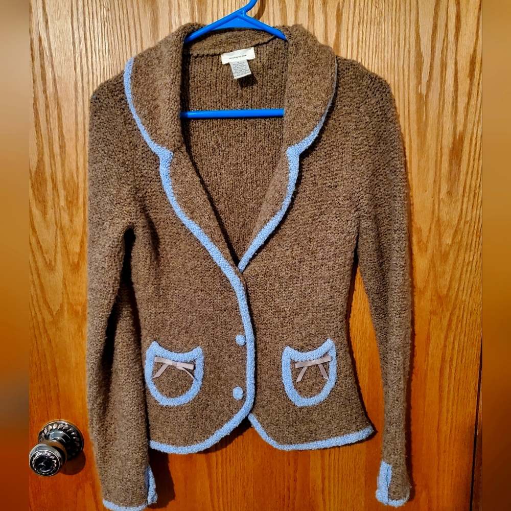 Sleeping on Snow brown and blue sweater